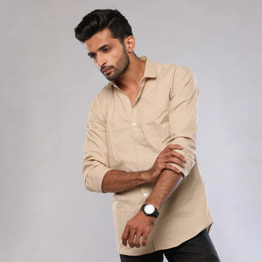 Cream Called by Name tee on a wooden hanger