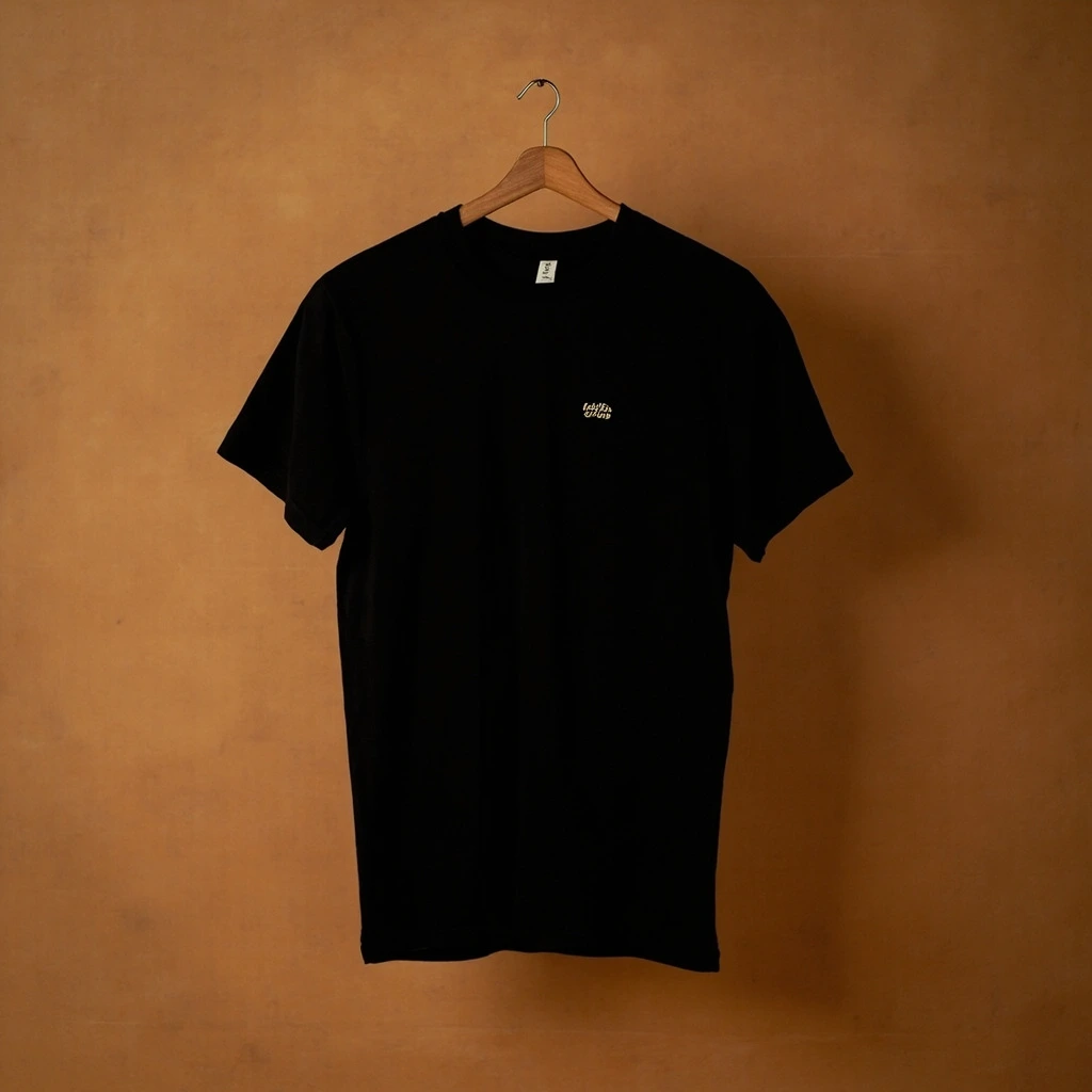 Black Fear Not tee on a wooden hanger